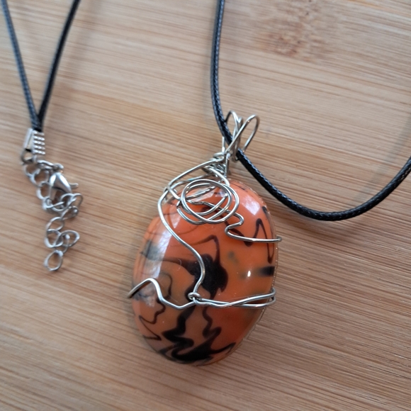 Jewelry - Elegant Wire-Wrapped Orange and Black Pendant Necklace